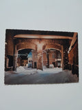 AK Schladminger Stadttor in einer Winternacht.