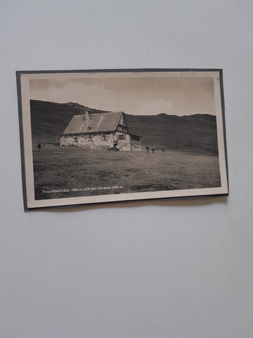 AK Touristenhaus mit der Koralpe.