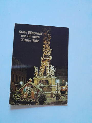 AK Baden bei Wien. Im Winter. Pestsäule am Hauptplatz.