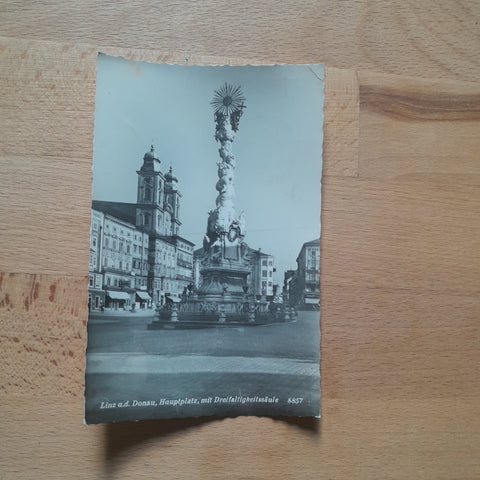 AK Linz Hauptplatz mit Dreifaltigkeistsäule.
