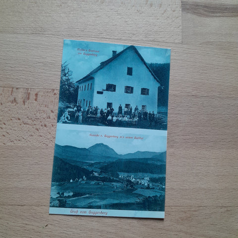 AK Gruss von Guggenberg. Müller's Gasthaus am Guggenberg. Aussicht v. Guggenberg ins untere Gailthal. (1908)