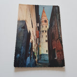 AK Caorle. Campanile con calle.