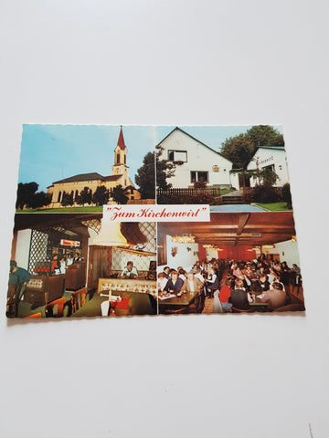 AK St. Johann o. H. Gasthaus zum Kirchenwirt J. Stadtegger.