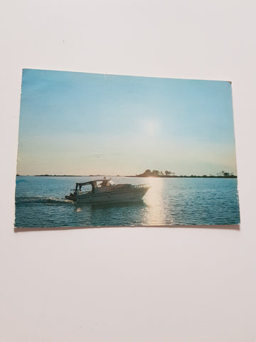 AK Siamo in vacanza sulla Riviera Adriatica. Tramonto in laguna.