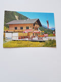 AK Mörtschach 35 an der Glocknerstraße. Gasthaus Pension Tauernblick Bes. Josef Suntinger.