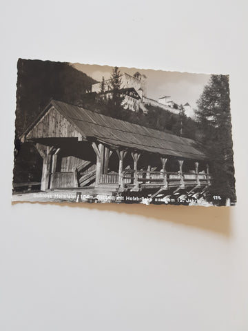 AK Schloss Heinfels mit Holzbrücke.
