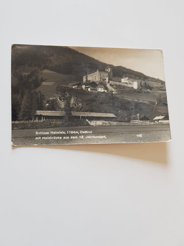 AK Schloss Heinfels mit Holzbrücke.