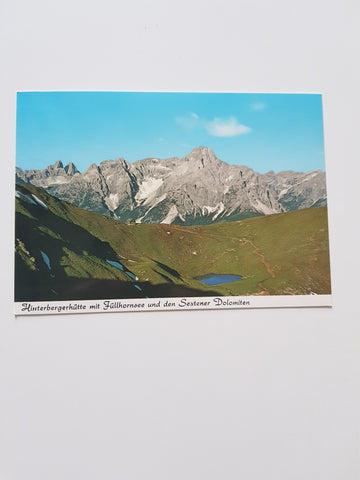 AK Hinterbergerhütte mit Füllhornsee und den Sextener Dolomiten.