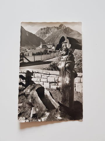 AK Der Ignatzbrunnen im Walsertal mit Blick auf Hirschegg.