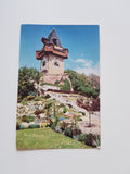 AK Graz, Alpengarten und Uhrturm am Schloßberg.
