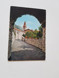 AK Venzone. Prima dei terremoti del 1976. Porta e Chiesa S. Giovanni.