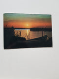 AK Siamo in vacanza sulla Riviera Adriatica. Tramonto in laguna.