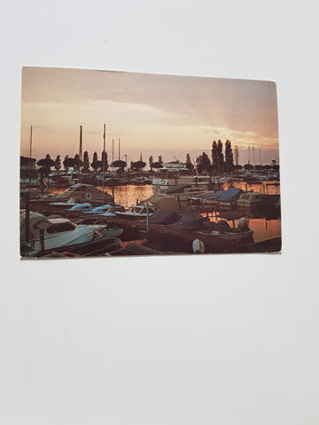 AK Siamo in vacanza sulla Riviera Adriatica. Tramonto in laguna.