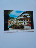 AK St. Gilgen am Wolfgangsee. Mozartbrunnen. Gasthof zur Post.