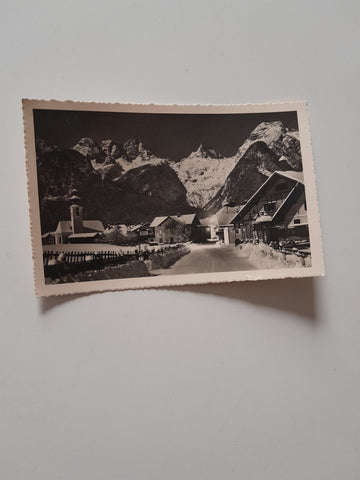 AK Lofer gegen die Steinberge bei Nacht.