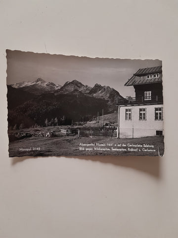 AK Alpengasthof Filzstein auf der Gerlosplatte. Blick gegen Wildkarspitze, Roßkopf u. Gerlosturm.
