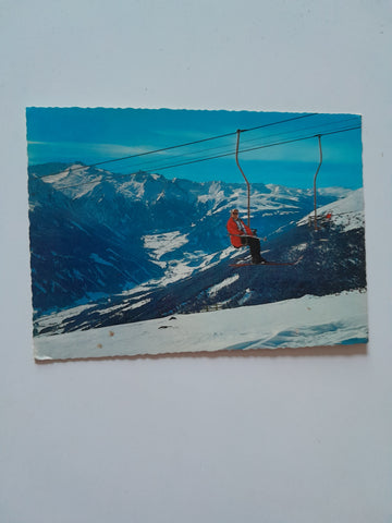 AK Neukirchen am Großvenediger. Wildkogel-Sesselbahn mit Blick auf Krimml und Zillertaler Alpen.