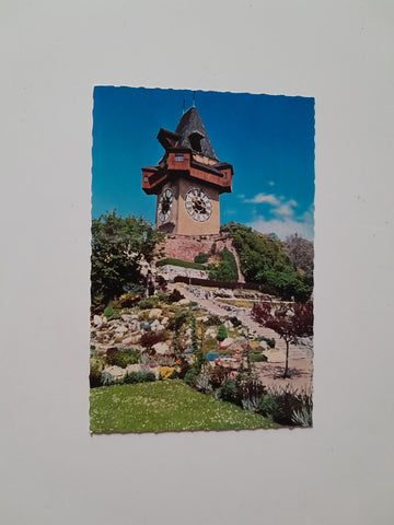 AK Graz. Alpengarten und Uhrturm am Schloßberg.