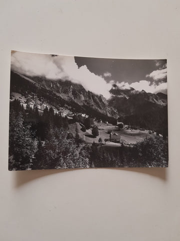 AK Carnia. Collina di Forni Avoltri. Nuvole sulle vette del Monte Coglians.