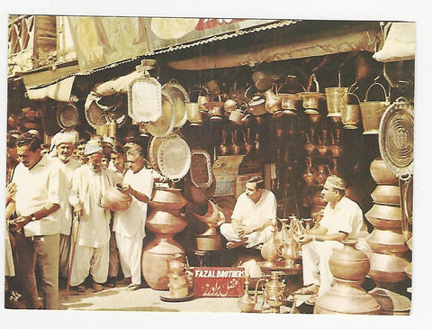 AK Peshawar, West Pakistan. A Typical Copperware Shop.
