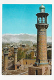 AK Tehran. Minarets of Sepahsalar Mosque against the Tochal Mountains.