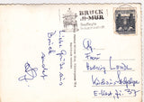 AK Bruck an der Mur. Eiserner Brunnen mit Kornmesserhaus und Uhrturm.