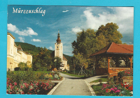 AK Mürzzuschlag. Volksschulpark mit Volksschule, Pfarrkirche und Fröschnitzsteg.