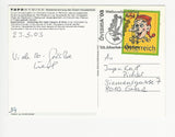 AK Gruß aus Graz. Kulturhauptstadt Europas. Wiederbenennung des Grazer Hauptplatzes. Gelaufen mit Sonderstempel ÖVEBRIA 2003 10. Marke+Münze. (Briefmarke 45 Jahre Kasperl im ORF).