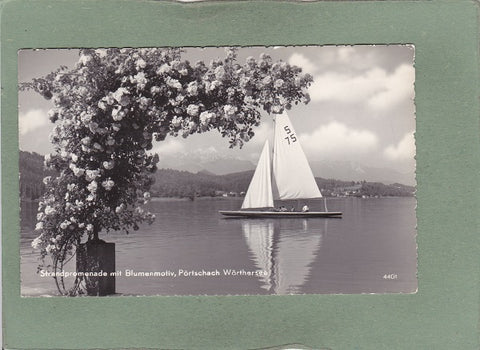 AK Strandpromenade mit Blumenmotiv, Pörtschach Wörthersee.