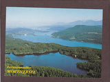 AK Forstsee. Im Hintergrund der Wörthersee mit Pörtschach und Klagenfurt.