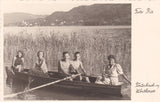 Foto Mit dem Ruderboot am Wörthersee bei Pörtschach. Im Hintergrund Maria Wörth.