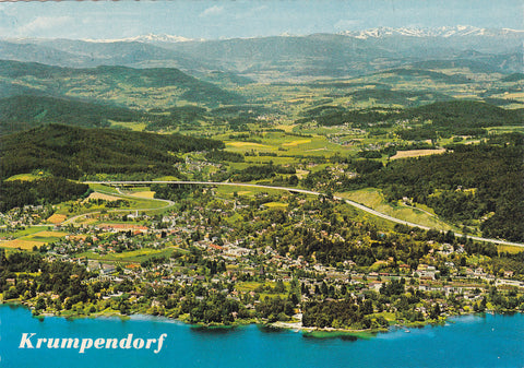 AK Krumpendorf am Wörthersee gegen die Kärntner Nockberge.
