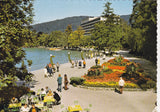AK Alpenseebad Pörtschach am Wörthersee. Blumenpromenade gegen Parkhotel.