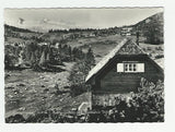 AK Tauplitzalm. Marburgerhütte mit Dachstein.