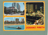 AK Lignano Pineta. Il centro di notte e di giorno.