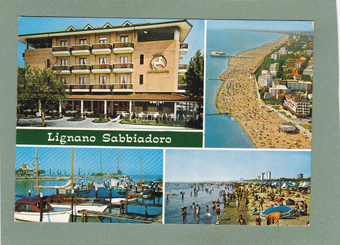AK Lignano Sabbiadoro. Ristorante Cavallino Bianco darsena e spiaggia.