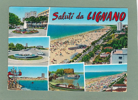 AK Saluti da Lignano. Barca sportiva all'ingresso della darsena.