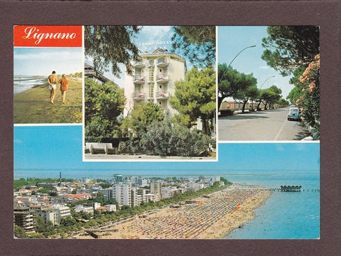 AK Lignano. Passeggiata Lungomare. Hotel Playa e la grande spiaggia.