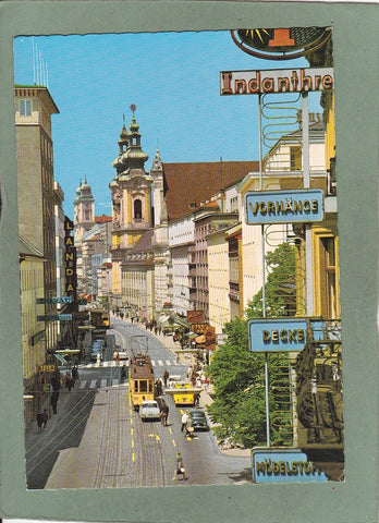 AK Linz, Donaustadt am Alpenrand. Landstraße von der Mozartkreuzung aus gesehen.