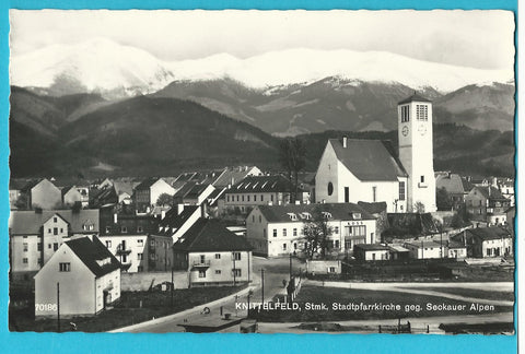AK Knittelfeld. Stadtpfarrkirche geg. Seckauer Alpen. (1960)