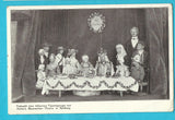 AK Festmahl einer hölzernen Figurengruppe aus Aicher's Marionetten-Theater in Salzburg.
