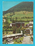 AK Teilansicht von Bad Kleinkirchheim mit Kurhotel Ronacher, Hotel Pulverer und St. Kathrein. Kirchlein im Hintergrund.