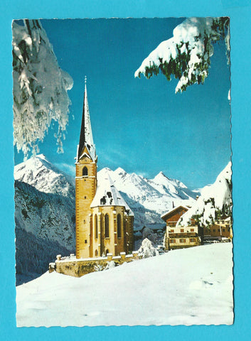 AK Heiligenblut an der Glocknerstrasse Bergkirstalbrunnen mit Trachtengruppe.