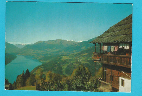 AK Bauernhaus mit Blick auf Millstättersee und Grossglockner.