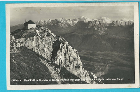 AK Villacher Alpe Bleiberger Knappenkirche mit Blick gegen die Karnisch Julischen Alpen.