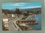 AK Kurort Velden am Wörther See mit Badeanlagen und Blick gegen die Gerlitzen.