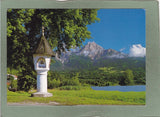 AK Bildstock am Faaker See mit Mittagskogel.