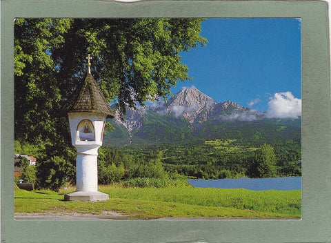 AK Bildstock am Faaker See mit Mittagskogel.