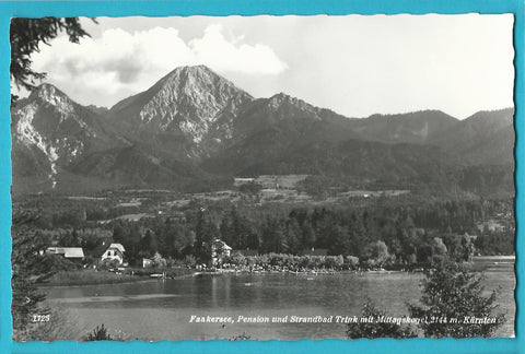 AK Faakersee, Pension und Strandbad Trink mit Mittagskogel.