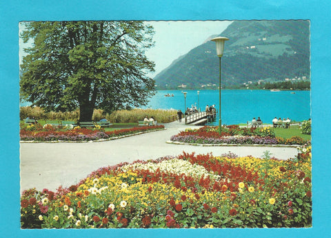 AK Ossiach am Ossiacher See. Blumenpromenade und Landestelle vor dem Stift.